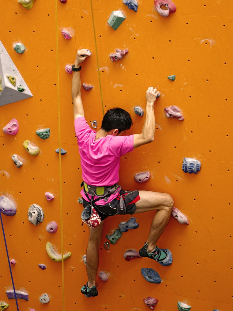 full length, extreme, rear view, effort, rock, hand, challenge, activity, recreation, rock climbing, bodybuilding, skill, extreme sports, concentration
