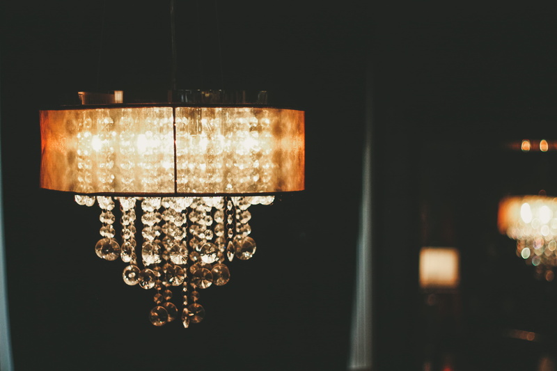 hanging, wealth, electricity, copy space, electric light, black background, ornate, indoors, chandelier, crystal, illuminated, technology, wanna, electric lamp