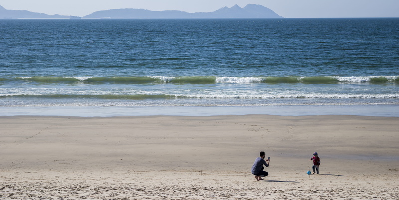 vigo, women, moment, outdoors, land, positive emotion, men, nature, motion, praia de samil, sea, family, beauty in nature, togetherness, sand, spain, cute
