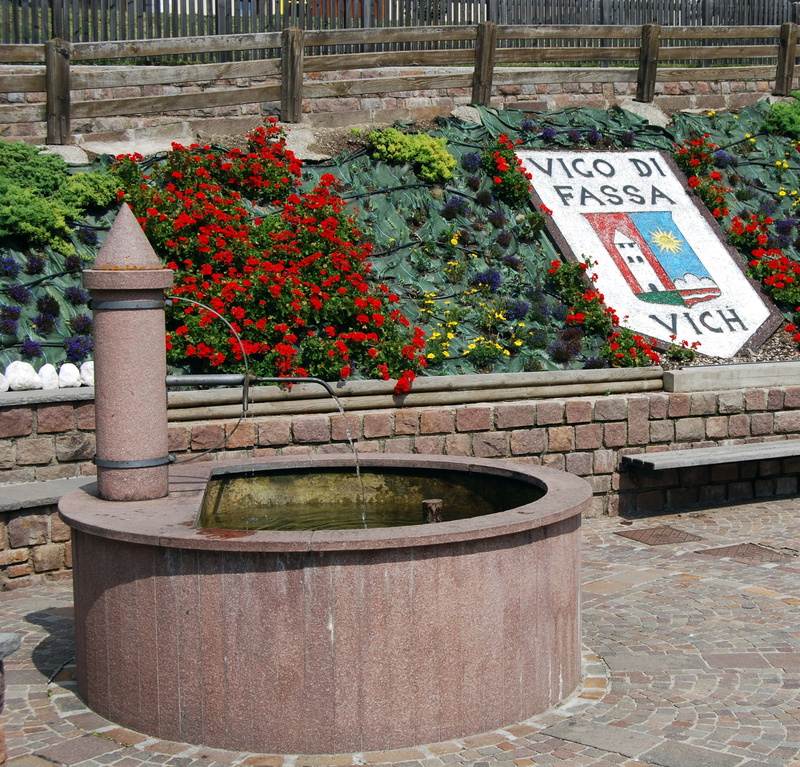 ornamental garden, building exterior, outdoors, flower pot, flowers, vigo di fassa, flower, flower bed, fontana, piazza, day, city, italy, built structure