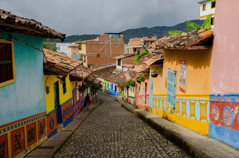 sunny, sky, places of interest, building, street, outdoors, residential district, cloud - sky, diminishing perspective, holiday, direction, guatape, tourism