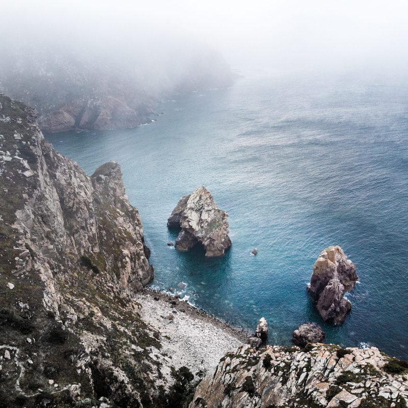 scenics - nature, rock - object, outdoor, sea, cold, idyllic, rocky coastline, gray, drone, bay, ocean, fog, beauty in nature, 2K, formation, high angle view