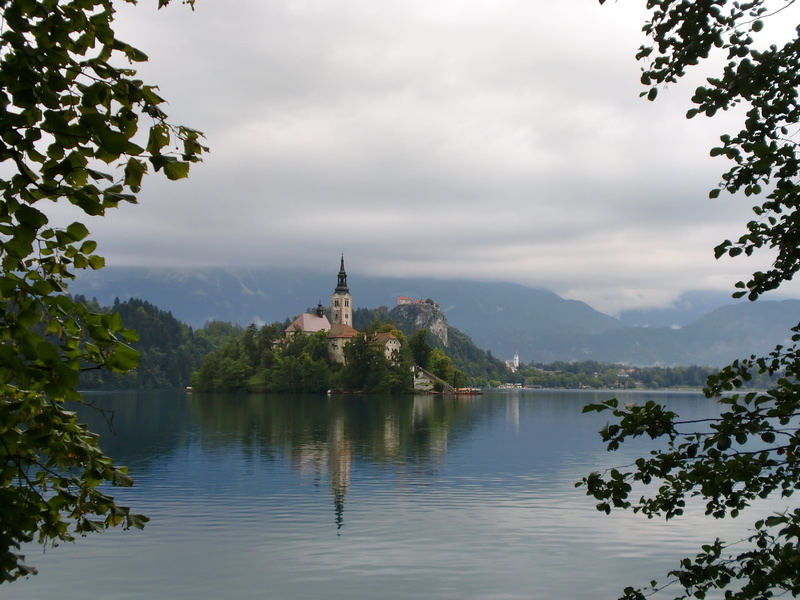 building exterior, no people, slovenia, beauty in nature, religion, sky, castle, waterfront, outdoors, scenics - nature, place of worship, church, lake