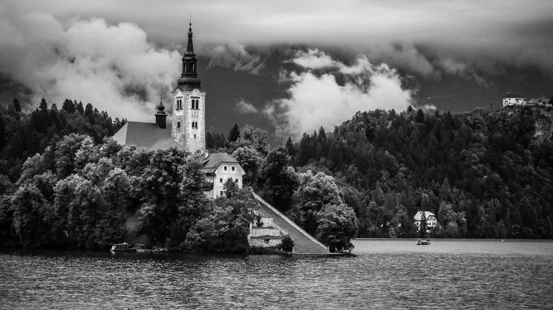 architecture, 2K, travel destinations, building exterior, tower, landscape, plant, near, structure, surrounded, no people, graycale, nature, outdoors
