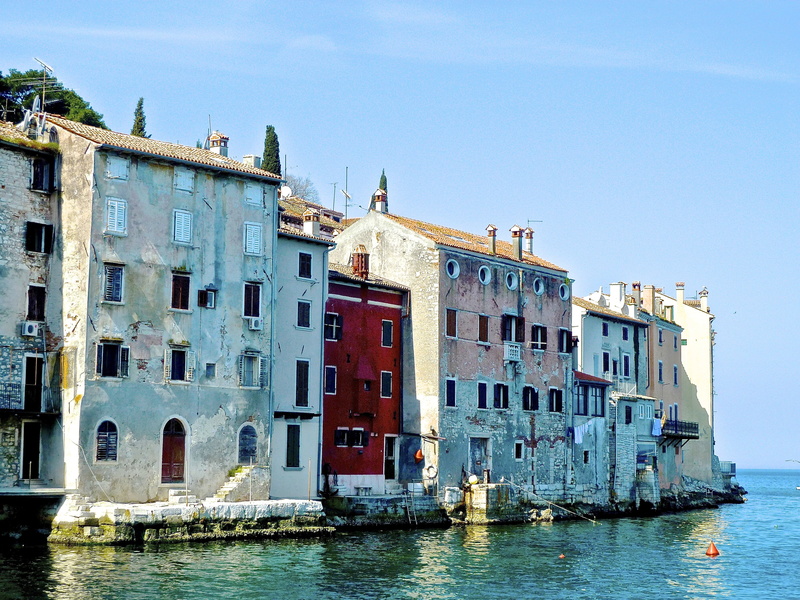 transportation, building exterior, nautical vessel, canal, outdoors, built structure, water, window, residential district, buildings, harbor, city, sky
