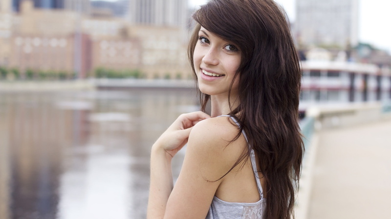 smiling, standing, looking over shoulder, purple, 2K, looking at camera, beauty, teenager, hairstyle, brunette, s, long hair, top, hair, focus on foreground