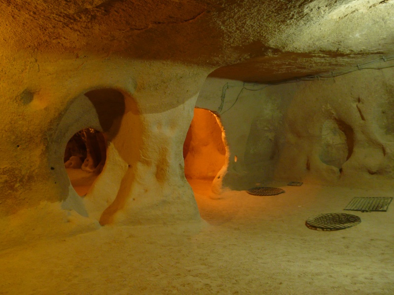 shoe, no people, body part, animal wildlife, water, underground city, 2K, beige, home, close-up, indoors, turkey, underground, stone, high angle view