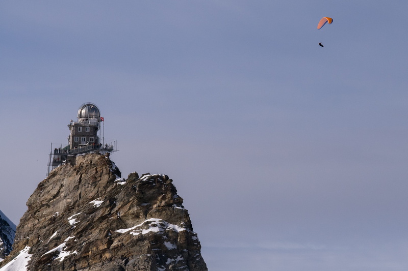 sport, rock - object, winter, mountain, risk, built structure, building exterior, safety, architecture, low angle view, leisure activity, extreme sports