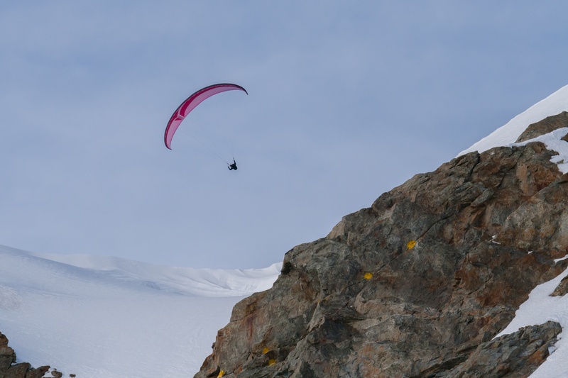 mid-air, mountain, risk, beauty in nature, sky, flying, adventure, exhilaration, extreme sports, winter, scenics - nature, parachute, outdoors, freedom