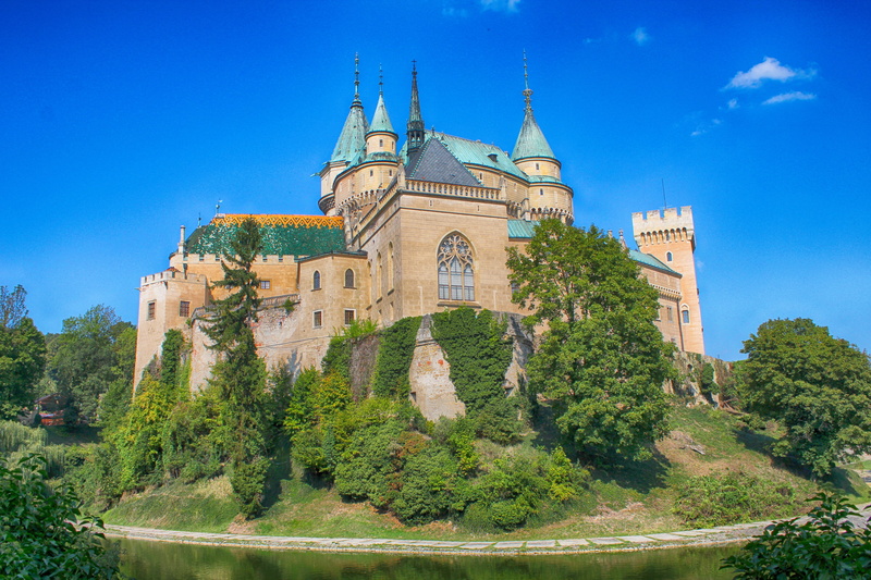sky, castle, lock, outdoors, place of worship, tourism, architecture, day, abbey, religion, travel destinations, no people, travel, nature, building exterior
