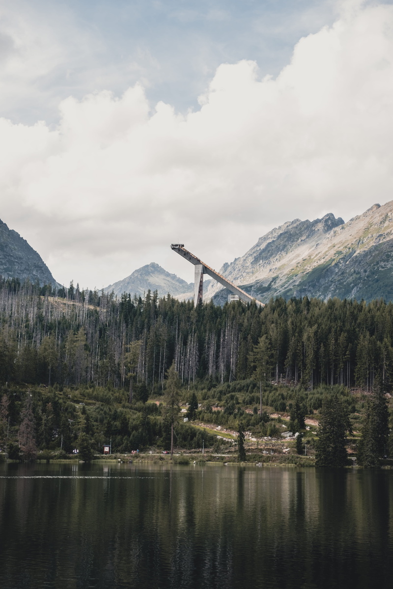 structure, cloud - Sky, pine Tree, sky, jump, outdoors, skijump, tourism, european Alps, tranquil Scene, forest, tree, green Color, summer, blue, mountain Range
