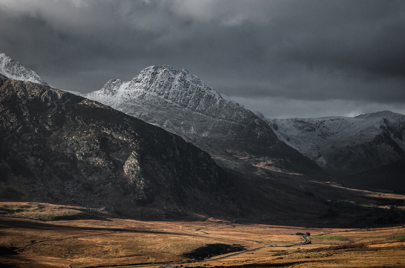 beauty in nature, storm, tranquility, remote, day, sky, tranquil scene, land, mountain peak, overcast, mountains, nature, mountain range, outdoors, landscape