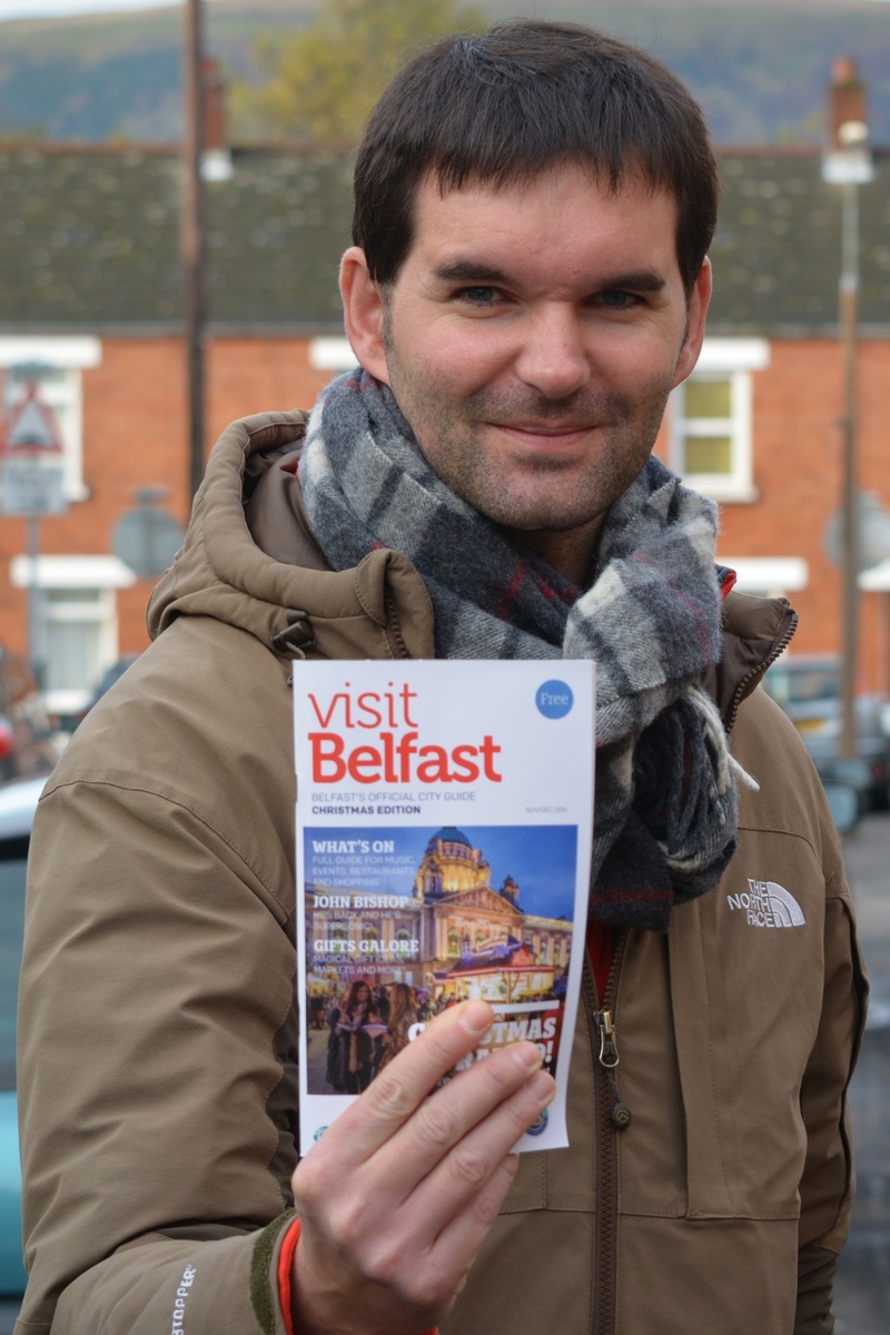 text, smiling, looking at camera, business, males, men, outdoors, people, belfast, waist up, portrait, one person, lifestyles, tourist, front view, travel guide