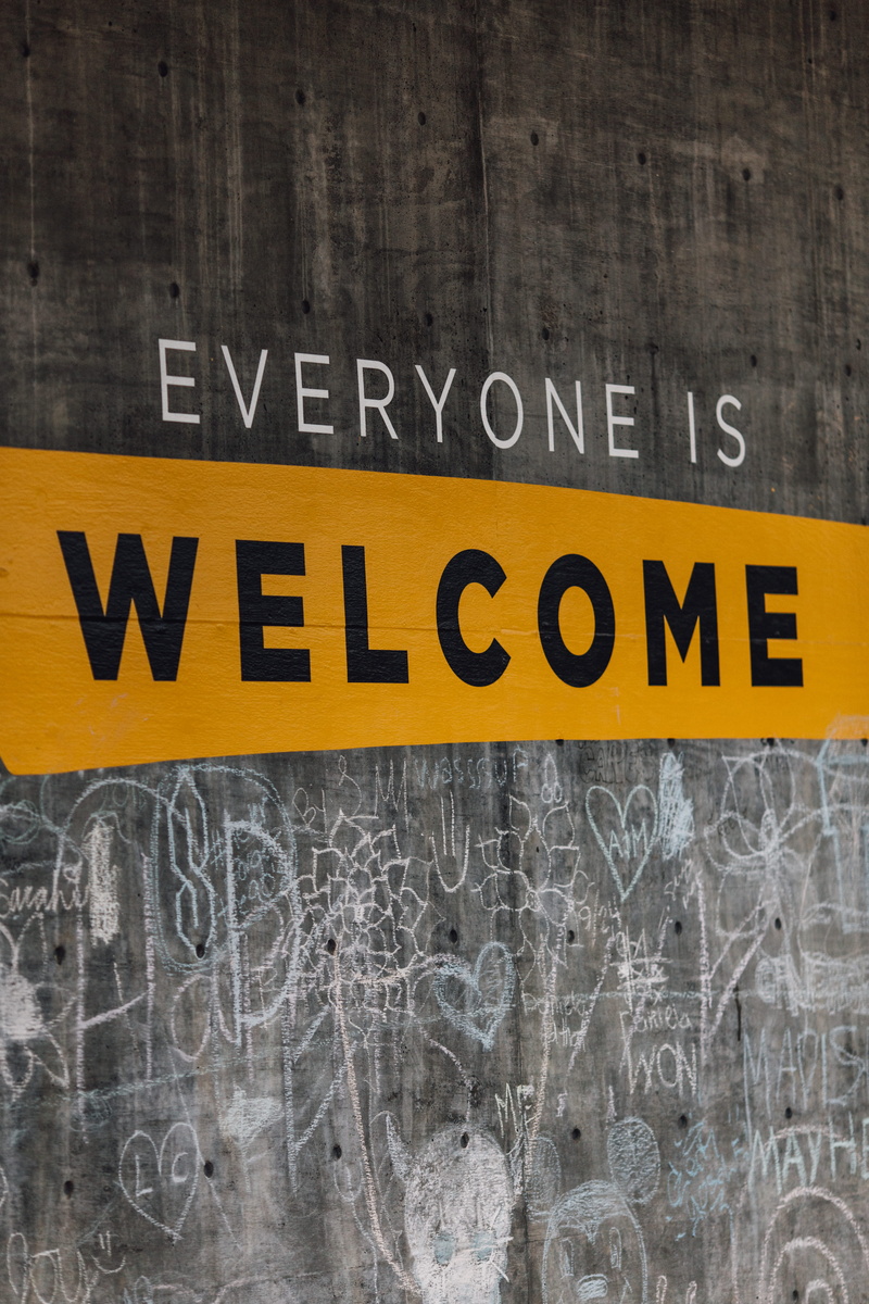 sign, capital letter, signage, western script, everyone, aggression, black color, safety, non-western script, no people, built structure, welcome, wall - building feature