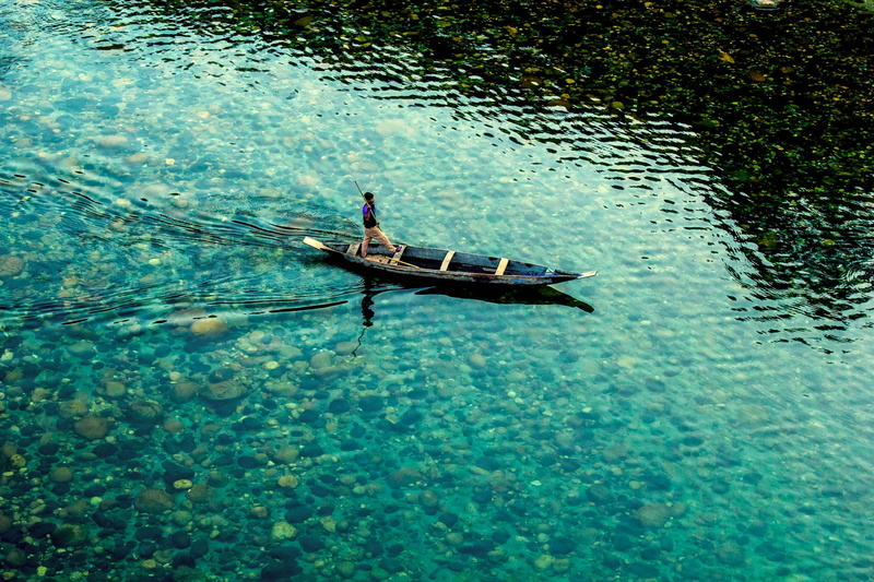 mode of transportation, rocks, sport, lake, beautiful, one person, boat, sea, travel, transportation, outdoors, daytime, hdr, canoe, real people, nautical Vessel
