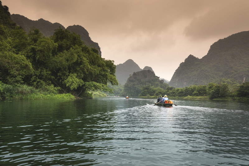 trees, tour, rowboat, 5K, one person, outdoors, sky, real people, ride, tourist, scenic, scenics - nature, lifestyles, canoe, nature, mountain range, landscape