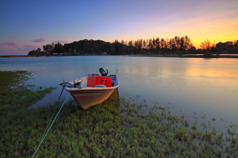 lake, beauty in nature, no people, nautical vessel, tree, transportation, river, canoe, sunrise, shore, dawn, grass, tranquil scene, trees, sky, watercraft