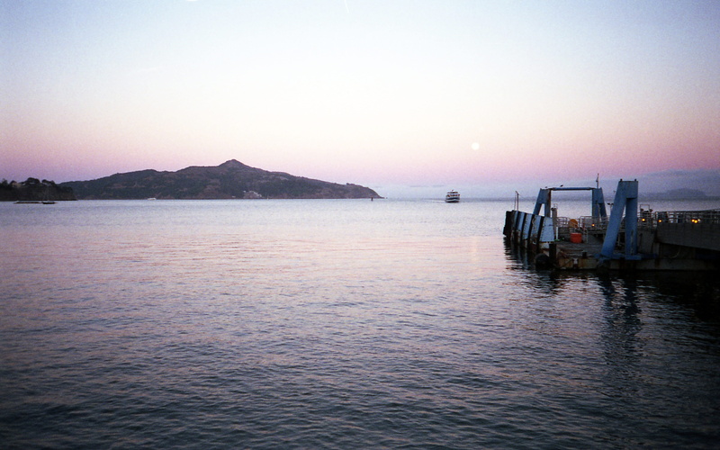 travel, idyllic, watercraft, rippled, mountains, vehicle, scenics - nature, sky, ocean, pier, tranquil scene, reflection, dawn, boat, transportation, no people