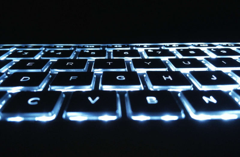 communication, wireless technology, technology, letter, close-up, backlit, blue, text, computer equipment, computer key, computer part, black background