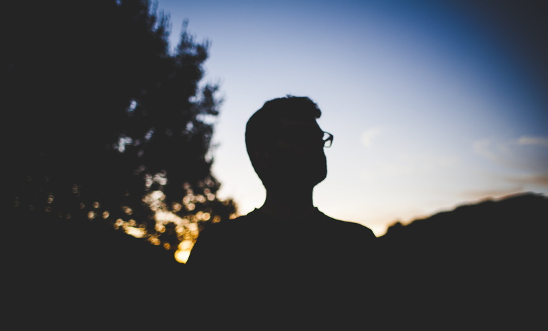 people, portrait, dusk, adult, man, person, mountain, headshot, one person, profile view, evening, leisure activity, outdoors, sunset, sunlight, lifestyles