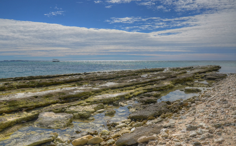 outdoors, holiday, scenics - nature, water, rocky coastline, boat, nature, lady musgrave island, blue, rock - object, beach, ground, day, great barrier reef