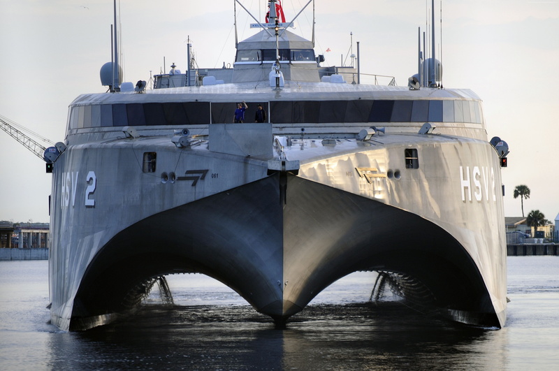 HSV-2 Swift, moored, sea, harbor, outdoors, passenger craft, USAV, transportation, architecture, waterfront, mode of transportation, water, sky, catamaran