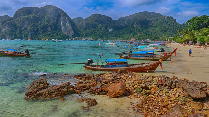 sea, travel, fisherman, day, incidental people, scenics - nature, mountain, water, mountain range, rock, outdoors, beauty in nature, paradise, rock - object