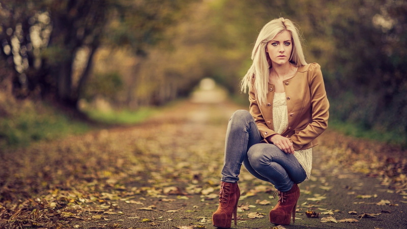 boot, kneeling, tree, beautiful woman, jeans, outdoors, young adult, woman, women, full length, portrait, near, sitting, dry, long hair, one person, leaves