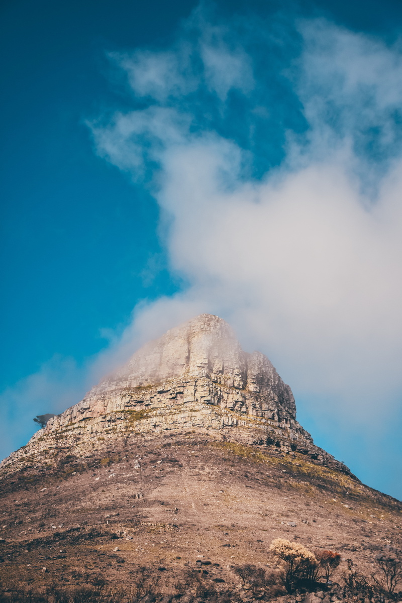 grassland, hill, mountain, beige, mountian, environment, beauty in nature, 5K, sky, mountain peak, peak, formation, promontory, blue, power in nature