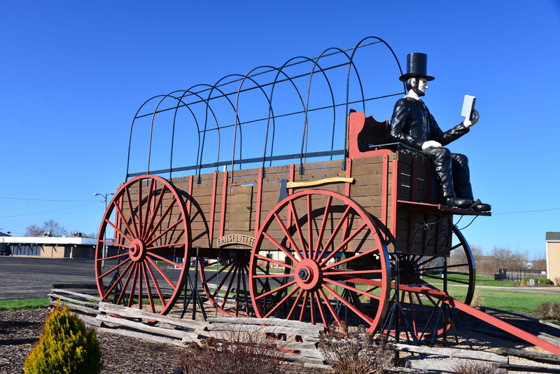 sunlight, landmark, historic, roadside attraction, protection, people, historical, clear sky, wagon, Illinois, interest, land vehicle, sky, vintage, wheel