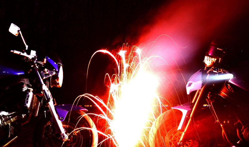 stage, event, crowd, motion, welding, blurred motion, performance, activity, enjoyment, people, sparkler, night, vehicle, midnight, motorcycle, lighting equipment