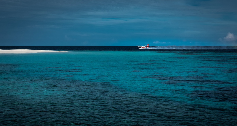 oceanscape, reef, water, sky, blue, nautical vessel, tranquility, plane, horizon over water, tranquil scene, ocean, turquoise colored, travel, waterfront