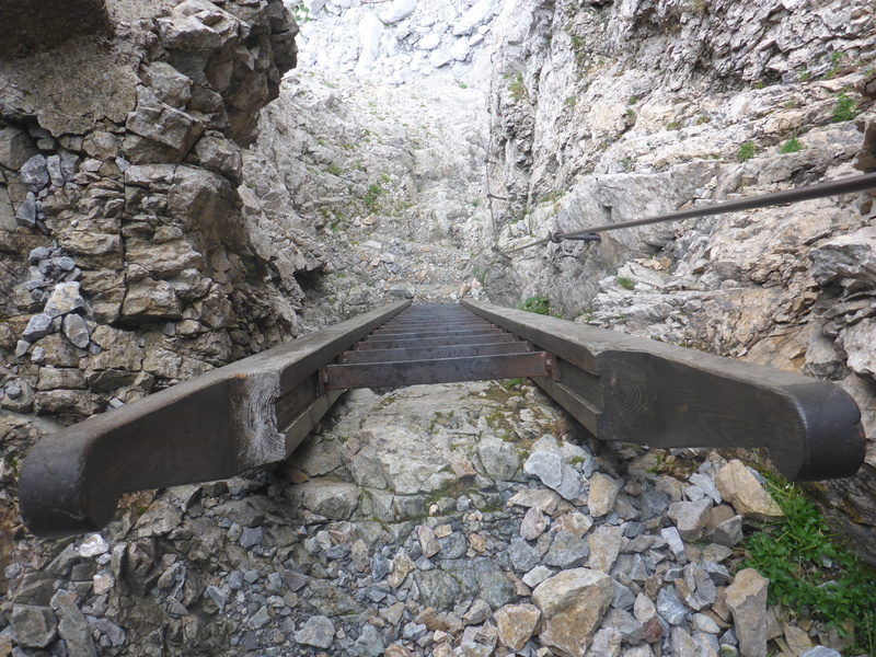architecture, built structure, wire rope, climbing platform system, mountaineering, water, steep, day, mountain, bridge - man made structure, rock, height