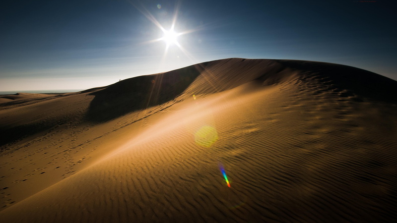 beauty in nature, horizon, sunlight, sunbeam, outdoors, tranquil scene, sun, nature, sand dune, climate, landscape, tranquility, land, light, desert, singing sand