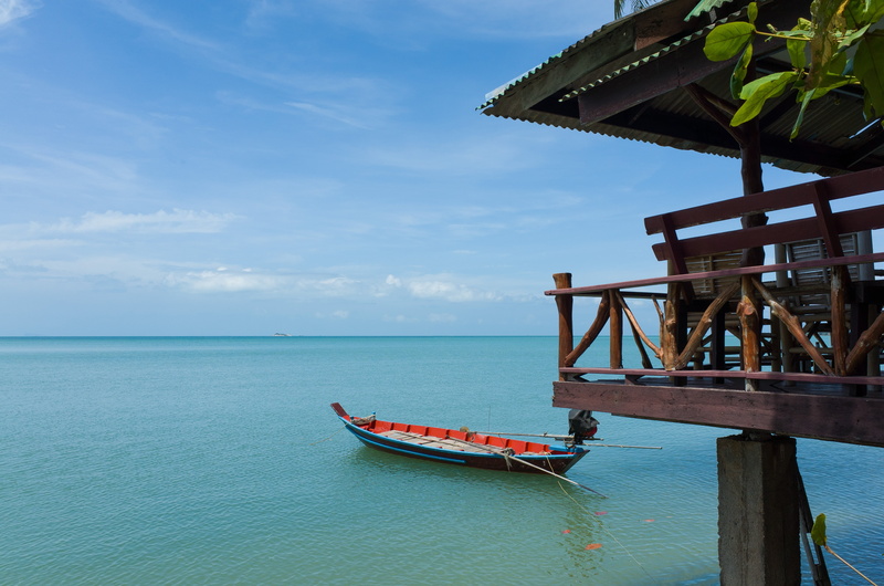 building, vacations, tranquility, beach, boat, idyllic, ocean, island, vacation, water, orange, outdoors, tranquil, turquoise, wood - material, sea, house