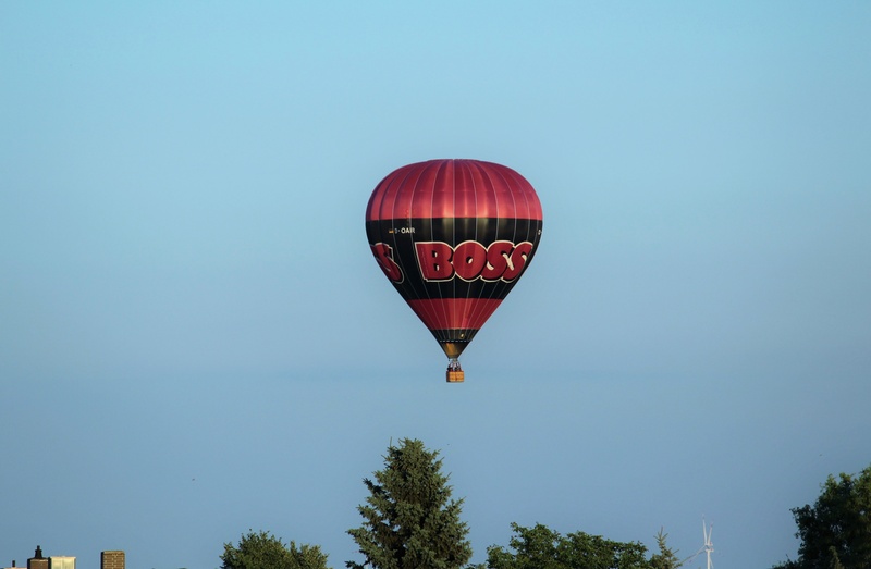 sky, travel, outdoors, transportation, day, mode of transportation, nature, ballooning festival, air, tree, balloon, fly, adventure, hot air balloon, summer