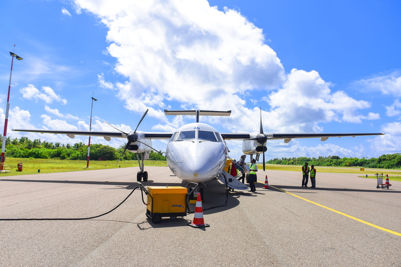 road, transportation system, propeller, clouds, technology, airplane, day, outdoors, no people, plane, cloud - sky, people, traffic cones, grey, aircraft