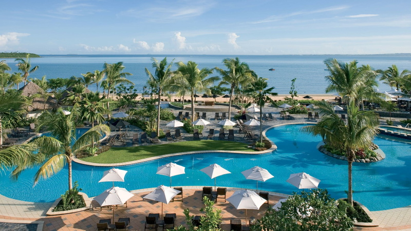 no people, caribbean, building exterior, swimming pool, nadi, resort, travel destinations, cloud - sky, denarau island, tropical climate, luxury, palm tree