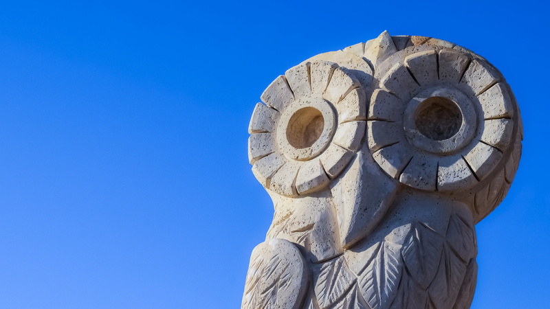 religion, representation, outdoors, art and craft, day, human representation, sculpture, sculpture park, copy space, close-up, owl, sunlight, wisdom, no people