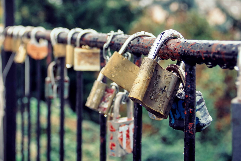 focus on foreground, close-up, love, padlock, day, emotion, metal, outdoors, black, safety, symbol, bridge, love lock, padlocks, fence, castle, positive emotion