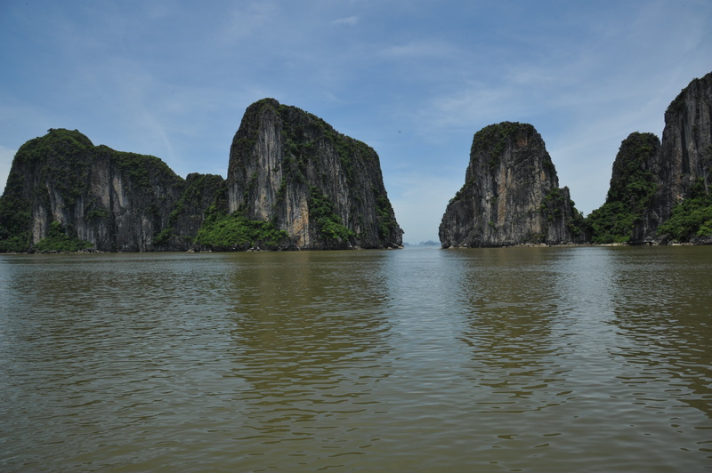 outdoors, water, tranquil scene, waterfront, cloud - sky, day, bay, tranquility, rock formation, scenics - nature, sea, viet nam, rock, land, solid, sky