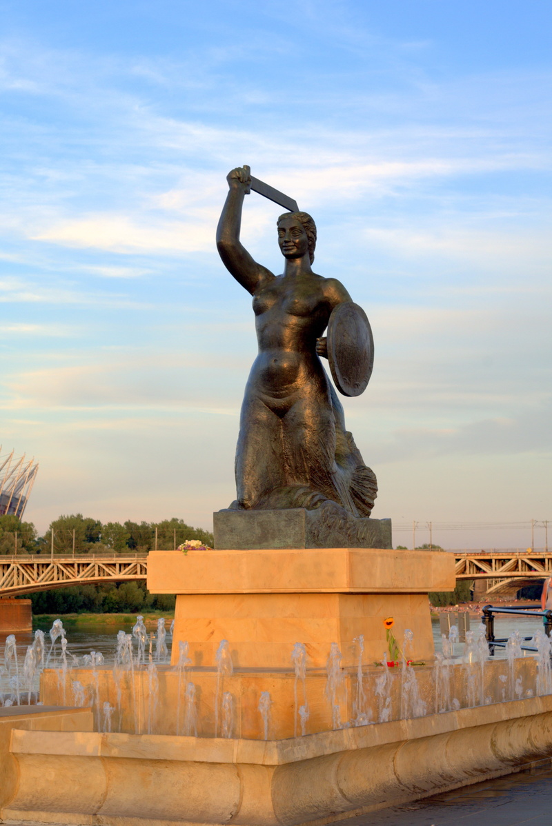 travel, statue, outdoors, creativity, travel destinations, mermaid, male likeness, built structure, sign, the statue, low angle view, fountain, representation