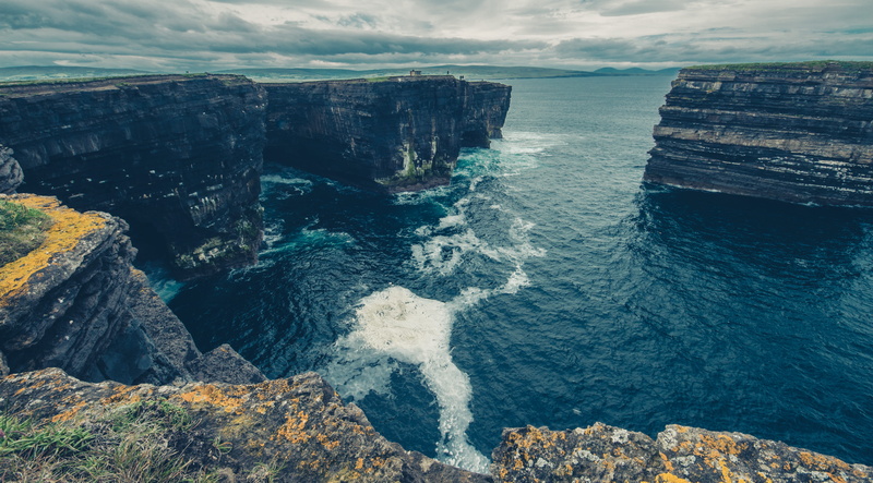 motion, power in nature, ballycastle, scenics - nature, no people, rocky coastline, beach, cliff, water, downpatrick head, beauty in nature, ireland, cloud - sky