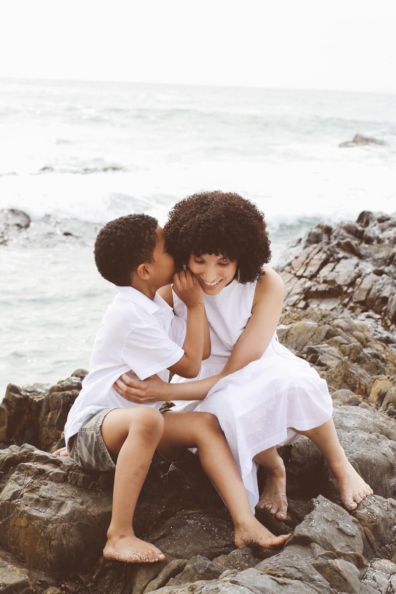 two people, nature, full length, outdoors, mom and son, shorts, ocean, horizon over water, water, secret, hair, woman, casual clothing, real people, childhood
