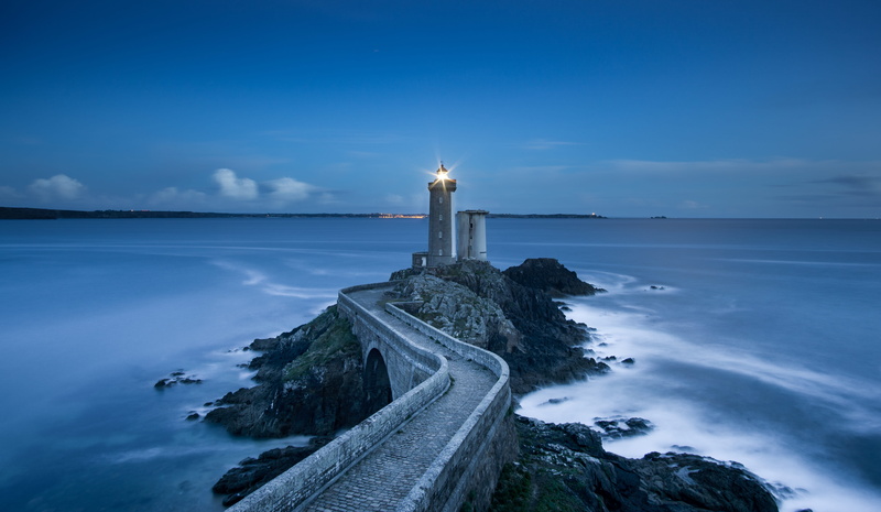 lighthouse, no people, guidance, architecture, water, pathway, cloud - sky, illuminated, concrete, travel, building, 5K, daytime, sky, scenics - nature