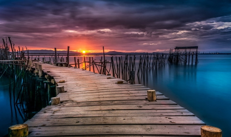 outdoors, clouds, sky, jetty, ports, landscape, beauty in nature, tranquil scene, pier, sunset, idyllic, wooden post, sun, hills, sea, tranquility, 720P