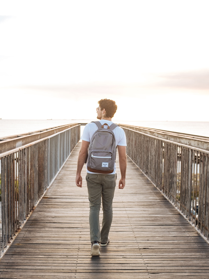 diminishing perspective, leisure, real people, dock, lifestyle, 4K, full length, lifestyles, the way forward, architecture, sea, boardwalk, one person