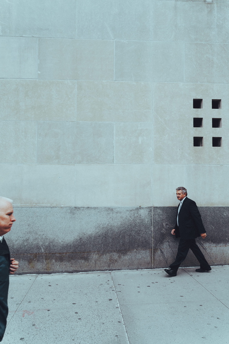 built structure, full Suit, physical Position, wall - building feature, full Length, near, outdoors, one person, color Image, two, only Men, building exterior