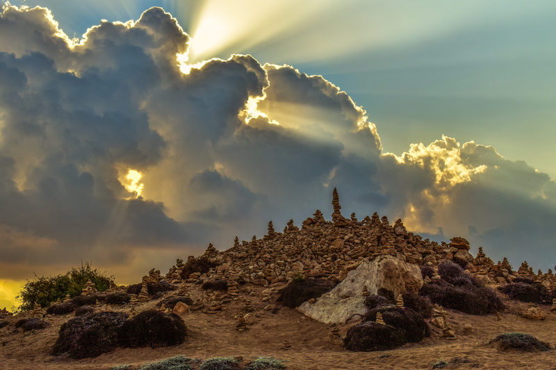 built structure, cyprus, rock formation, archaeology, tranquility, ruined, history, cloud - sky, clouds, scenery, sunbeam, outdoors, landscape, rock - object