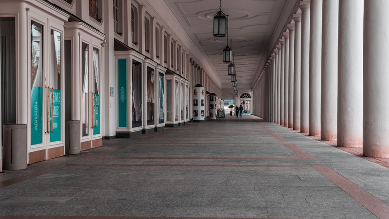 ceiling, indoors, wiesbaden, person, life, theatre, architecture, day, in a row, street, arcade, lighting equipment, walking, modern, diminishing perspective